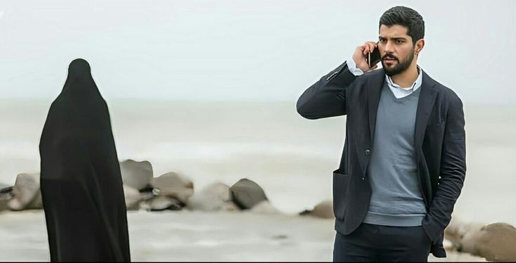 چهره مرد قوی در کنار زن